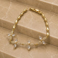 Pulseira luxo elo oval liso flor cravejada e cristal